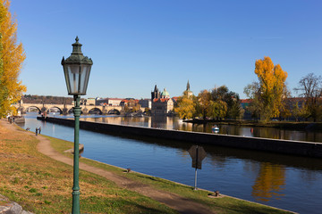 Colorful autumn Prague Old Town above River Vltava, Czech Republic