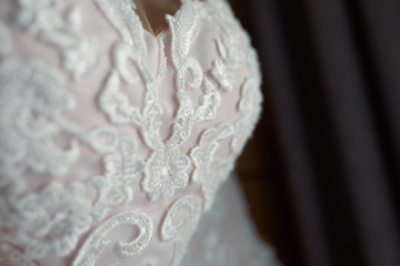 Delicate white laces on wedding dress corset