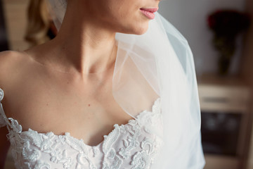 Obraz na płótnie Canvas Close-up of tender bride's naked shoulders
