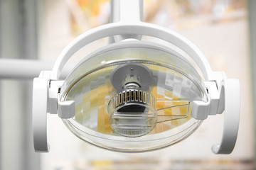 Dental light to illuminate the patient during operation.