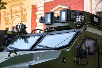 Close up of the windshield of an armored military vehicle with equipment for reconnaissance of the...
