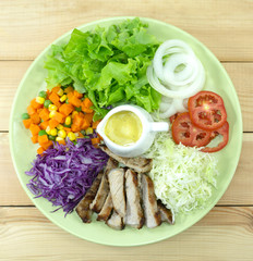 pork Salad in Plate on white background, Healthy salad diet food concept, Top view.