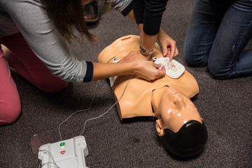First aid cardiopulmonary resuscitation course using automated external defibrillator device, AED.