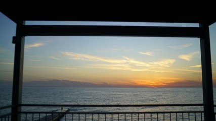 View of the sunset from the balcony. View from balcony in the morning at sunset.