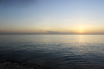 Relaxing Barbados blue beach at sunset in the morning