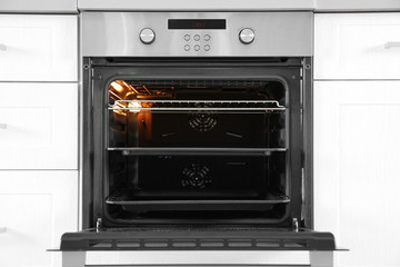 Open modern oven built in kitchen furniture