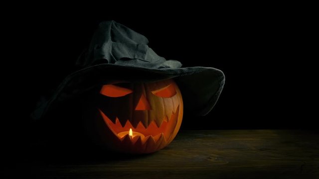 Scary Faced Pumpkin With Witches Hat