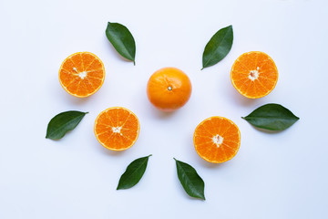Fresh orange citrus fruit with leaves isolated on white background.  Top view