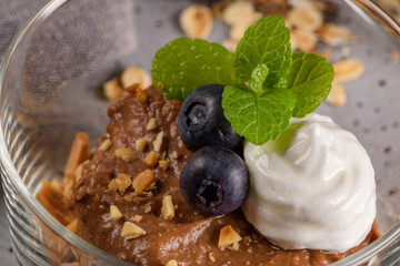 Glass cups of chocolate and chestnuts mousse
