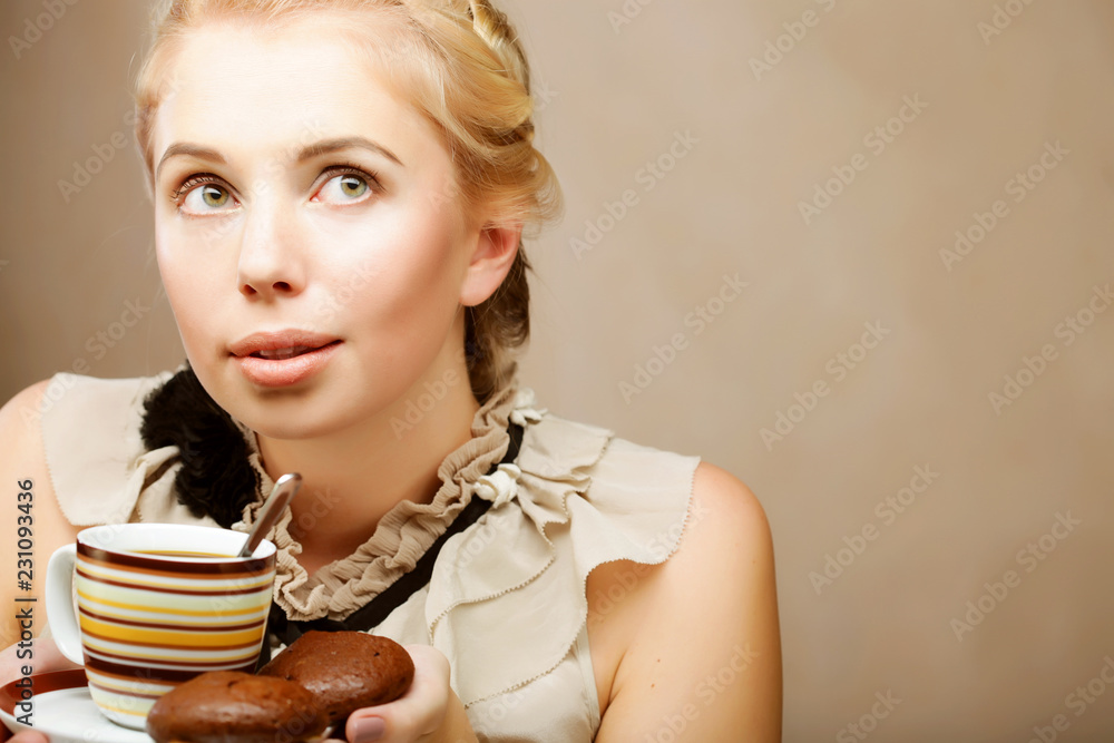 Wall mural woman with coffee and cookies