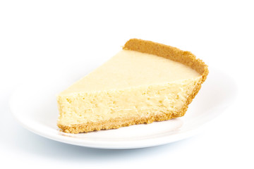 Fototapeta na wymiar Slice of Plain No Bake Cheesecake in a Graham Cracker Crust
