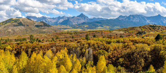 Sneffels Range - Panoramic fall view of rugged Sneffels Range, the northwest edge of the San Juan...