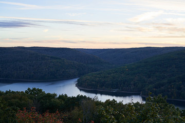 A colorful sunset above the Allegheny reservoir near autumn.