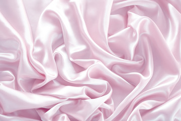 pink silk texture,bakground, luxurious satin for abstract,design and wallpaper,soft and blur style,smooth,template.fabric drapery and Solid for backs and pillows.upholstery fabric from the courtyard.