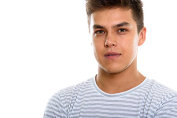 Fototapeta premium Close up of young handsome man looking at camera