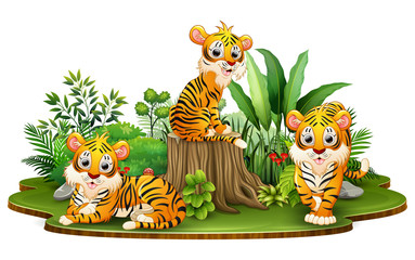Group of tiger cartoon in the park with green plants