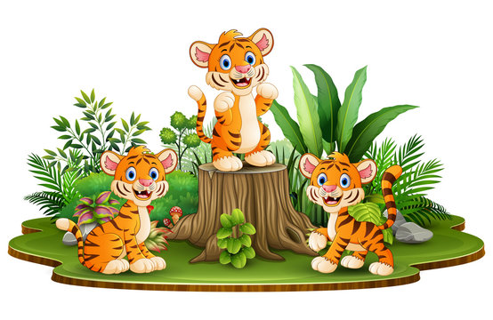 Happy tiger group with green plants