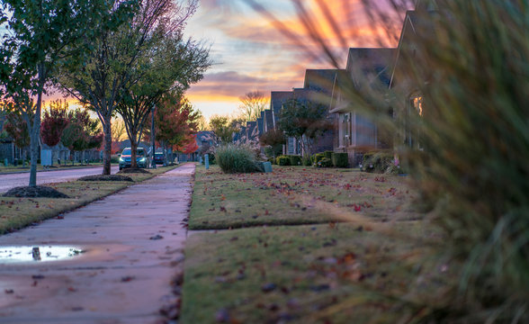 Living In Residential Housing Neighborhood Street At Sunset In Bentonville Arkansas