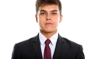 Close up of young handsome businessman looking at camera