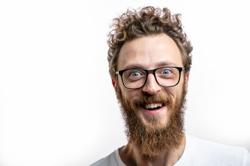 Emotional shot of cheerful caucasian unshaven mid-aged guy in casual t-shirt, looking really happy...