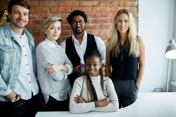 people of different nationalities working together. close up photo. successful team with African...