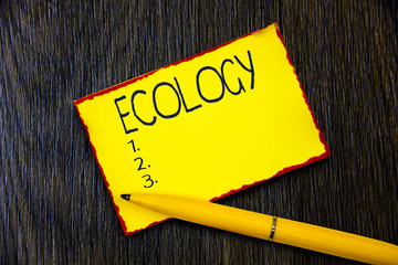 Handwriting text writing Ecology. Concept meaning Branch of science relation organisms environment...