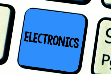 Handwriting text writing Electronics. Concept meaning Circuits or devices using transistors microchips digital device.