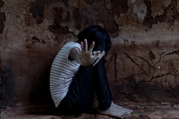 Violence and rape concept,concept photo of sexual assault,traumatized young girl