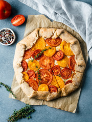 Savory fresh homemade tomato tart or galette.Ideas and recipes for healthy lunch,appetiezer- whole...