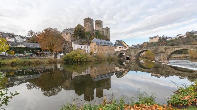 Runkel Castle and old stone bridge across the Lahn river in Runkel, Hesse, Germany (panoramic time lapse video)
