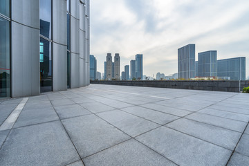 Panoramic skyline and buildings with empty square floor