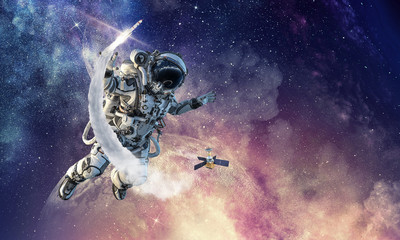 Obraz na płótnie Canvas Spaceman on mission. Mixed media