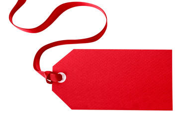 Red gift tag with ribbon isolated on white