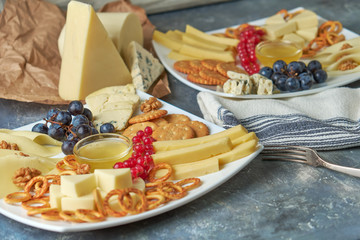 cheese platter on a plate with berries