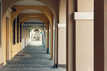 Montagnana, Italy August 6, 2018: Beautiful city street with pedestrian arches.