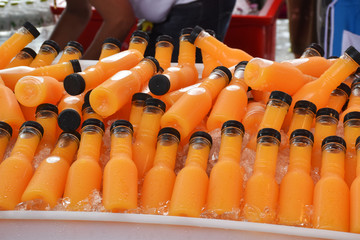 fresh orange juice in ice basket, sweet and tasty
