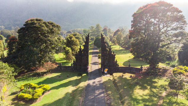 Aerial View Of Ancient Bali Style Gate With Pathway