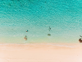 Top view of paradise beach with turquoise ocean water, aerial shot