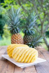 Pineapple on the wood  background