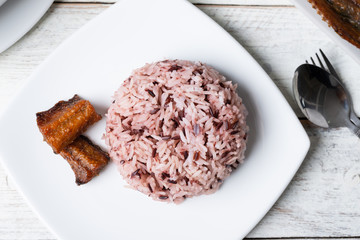 Steamed rice berry in white plate