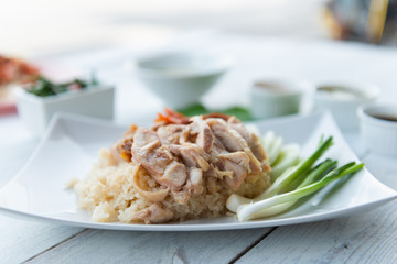 Hainanese chicken rice , gourmet steamed chicken with rice