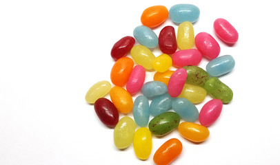 Colorful jelly beans on white