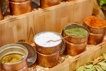 spices in metal bowls