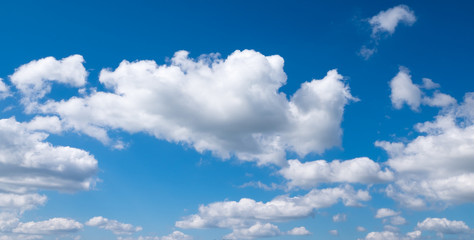 Clouds and blue skies in daylight.