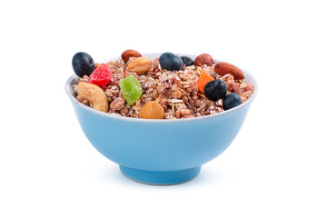 Bowl of granola breakfast isolated on white background
