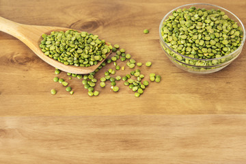 Dry peas with wooden spoon.