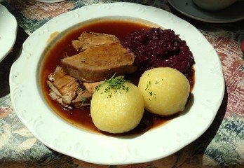 Sauerbraten with Red Cabbage and Potato Dumplings in Germany