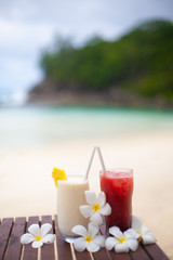 Two coctails on the tropical beach on Seychelles.
