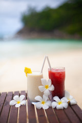 Two coctails on the tropical beach on Seychelles.