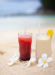 Two coctails on the tropical beach on Seychelles.